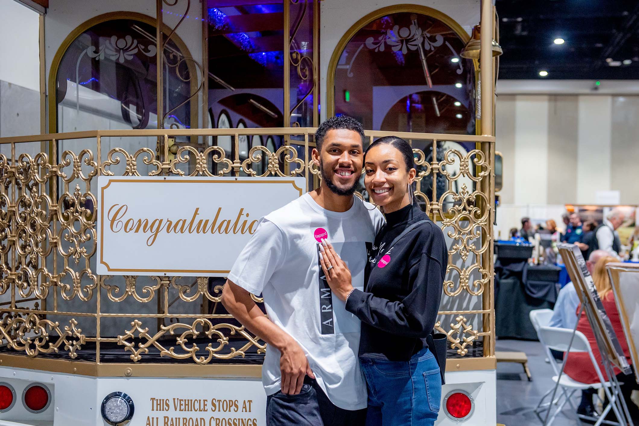 engaged couple at bridal show